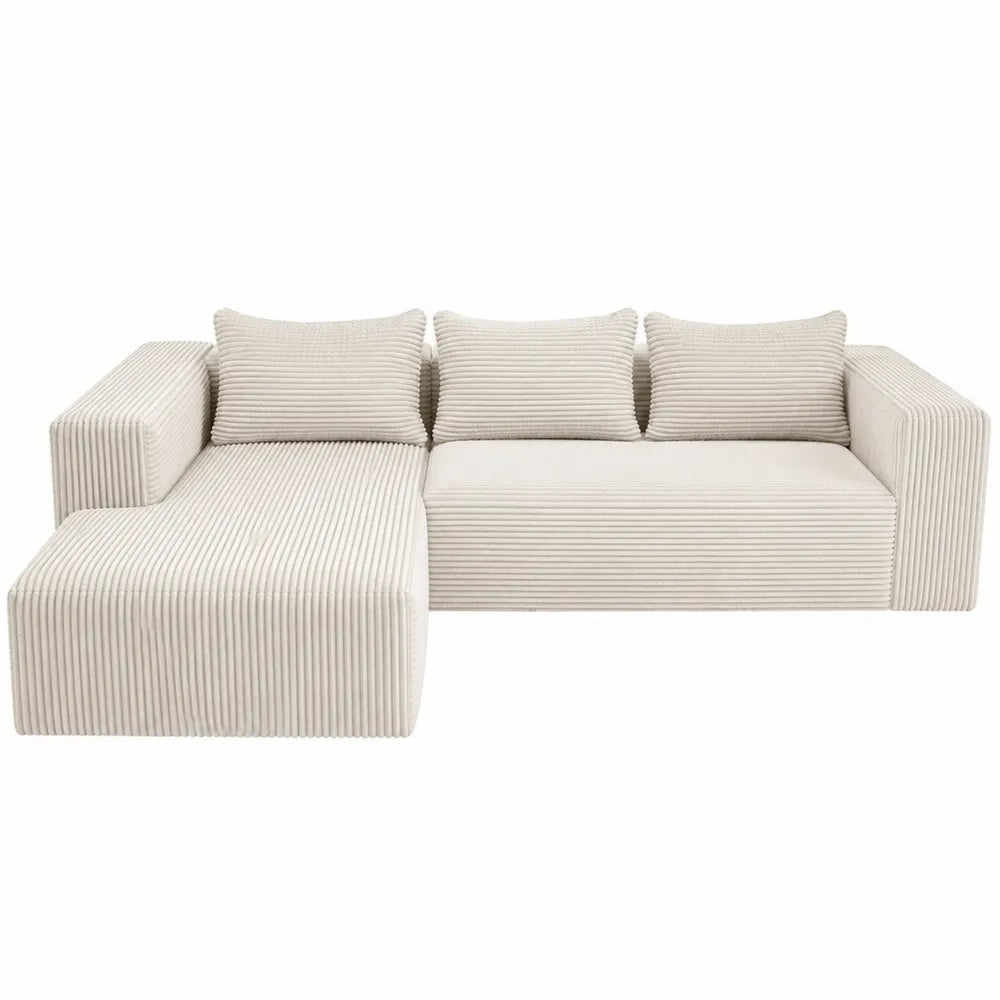 Divano angolare in tessuto a coste beige con cuscini