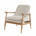 Poltrona in tessuto poliestere beige con telaio in legno di quercia e dettagli in ottone