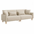 Divano in tessuto beige con gambe in legno di faggio